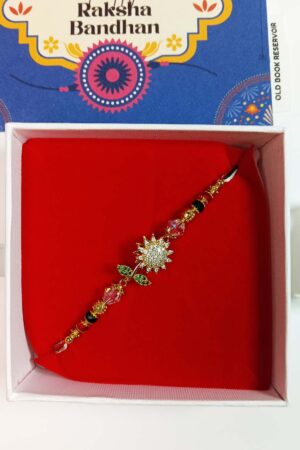 Spinning Floral Rakhi Gift Box: Premium Stone Designer Rakhi Set