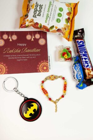 Yellow Rakhi Gift Box: Designer Rakhi and Batman Keychain Set